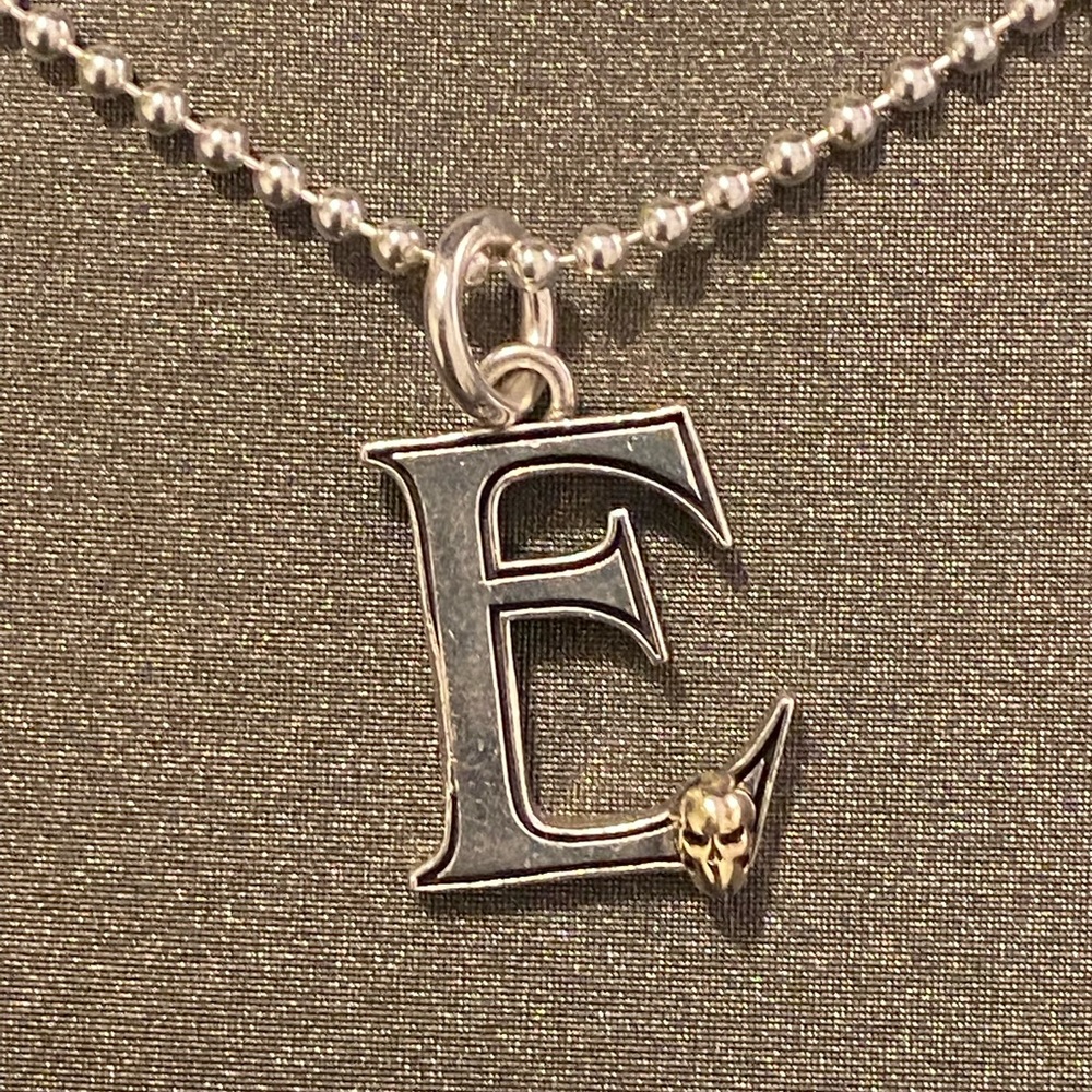 Room 101 silver and gold “E” necklace